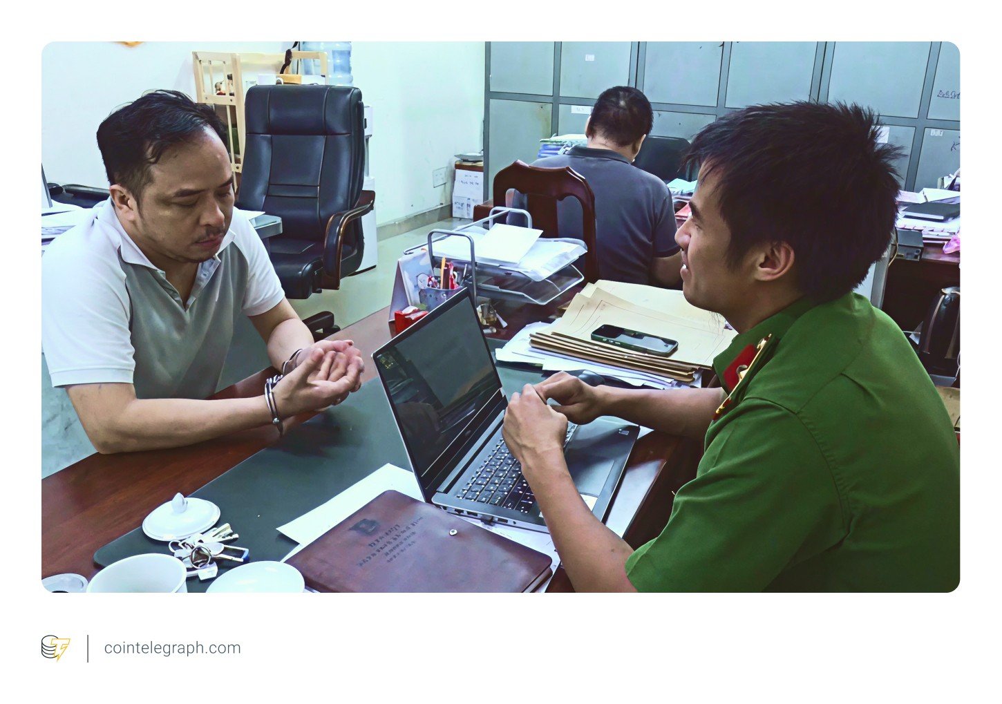 Tran Minh Quang (left), leader of the four suspects, was arrested