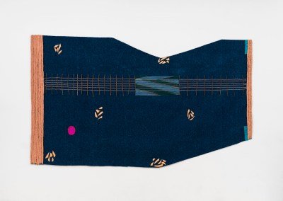 A blue textile piece with brown stitching running across its center.