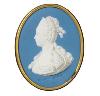 A blue cameo of Marie Antoinette's bust.