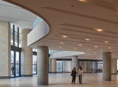Two people in an atrium.